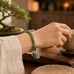 Laughing Buddha Cyan Jade Healing Bracelet featuring Laughing Buddha, Cyan Jade, Jade