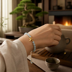 Natural Aquamarine Gold-Plated Copper Fish Tail Serenity Bracelet featuring Aquamarine, Copper
