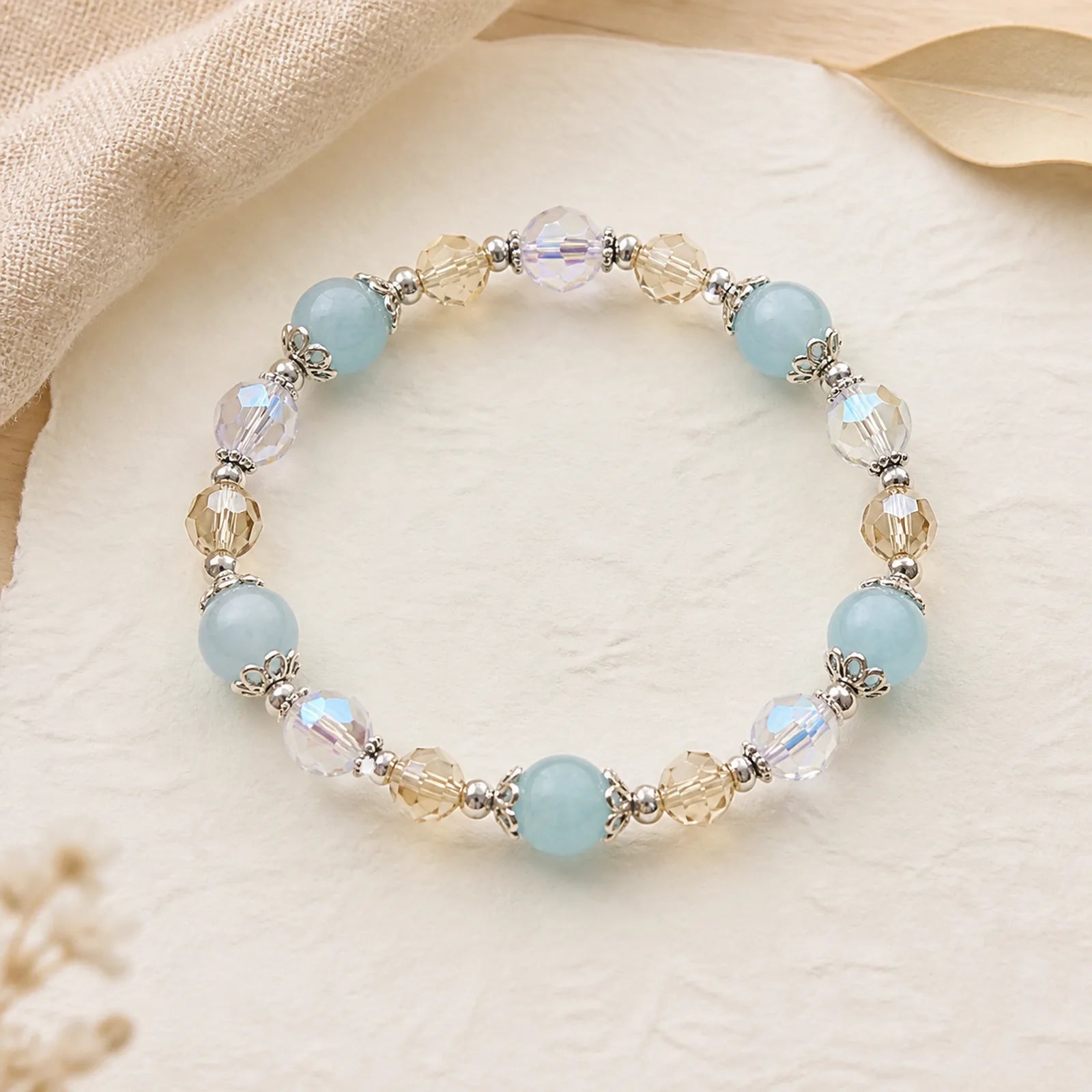 Natural Aquamarine Super Seven Crystal Sparkling Faceted Bead Peace Bracelet featuring Aquamarine, Super Seven Crystal, Amethyst