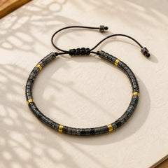 Natural Black Glitter Stone Courage Spacer Bead Bracelet featuring Black Glitter Stone