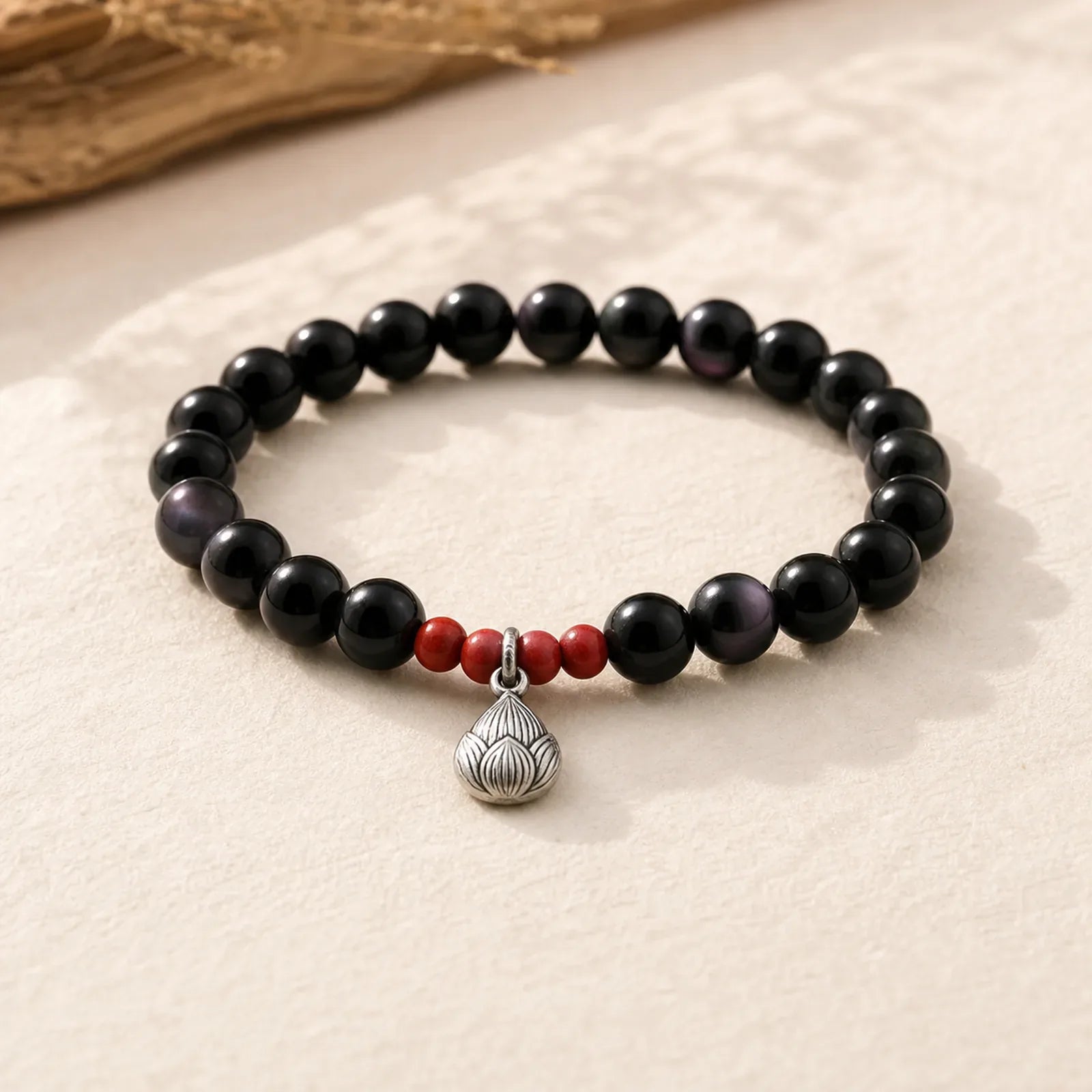 Natural Black Obsidian Cinnabar Lotus Charm Strength Fulfillment Bracelet featuring Black Obsidian, Cinnabar, Lotus