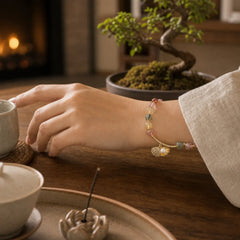 Natural Colorful Rutilated Quartz Shell Protection Bead Bracelet featuring Rutilated Quartz