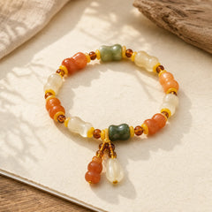 Natural Golden Silk Jade Gourd Wealth Charm Bracelet featuring Golden Silk Jade