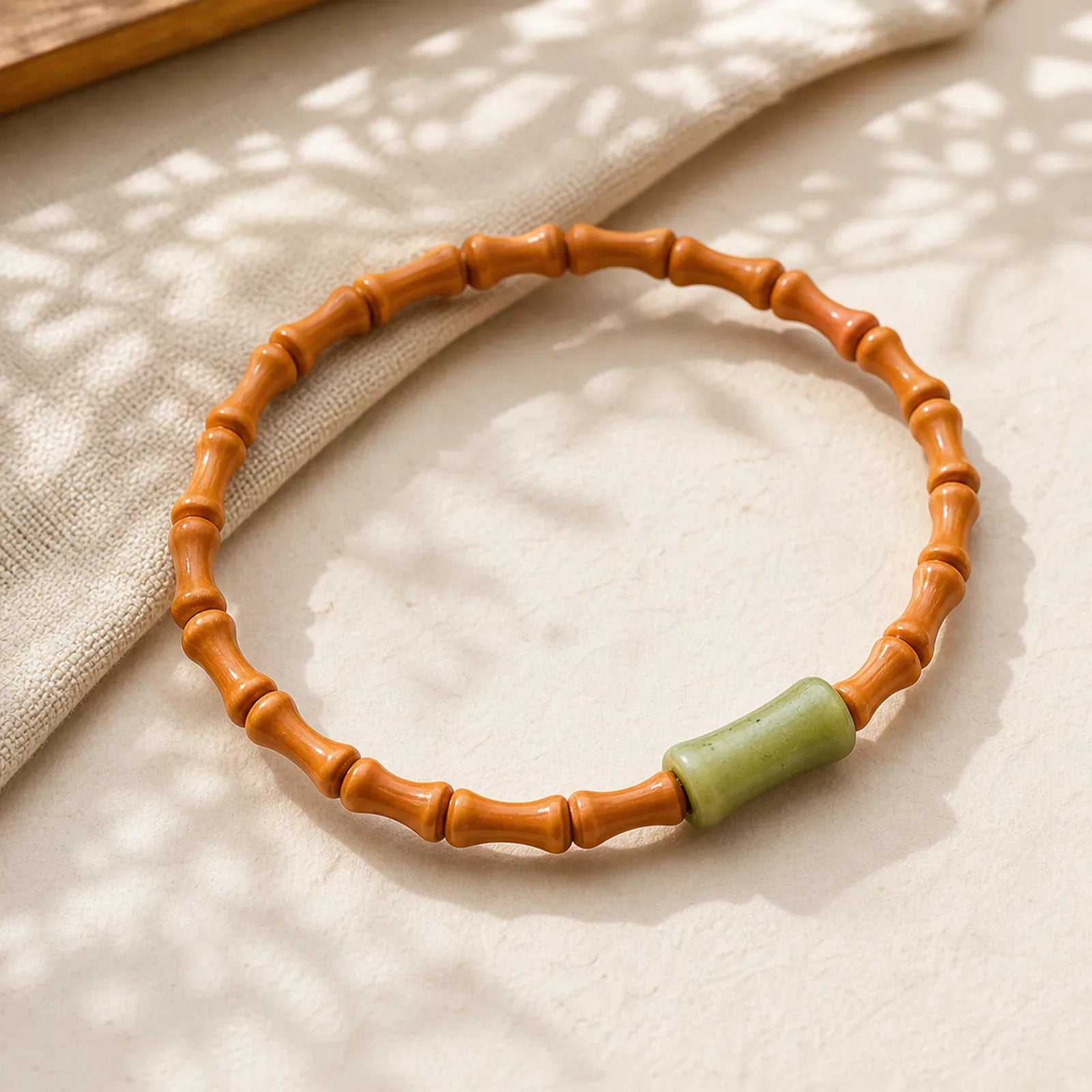 Natural Olive Pit Peridot Bamboo Design Protection Bracelet featuring Olive Pit, Peridot, Bamboo