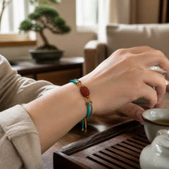 Natural Red Agate Pixiu Confidence Four-strand Braid Rope Bracelet featuring Red Agate, Pixiu, Red String
