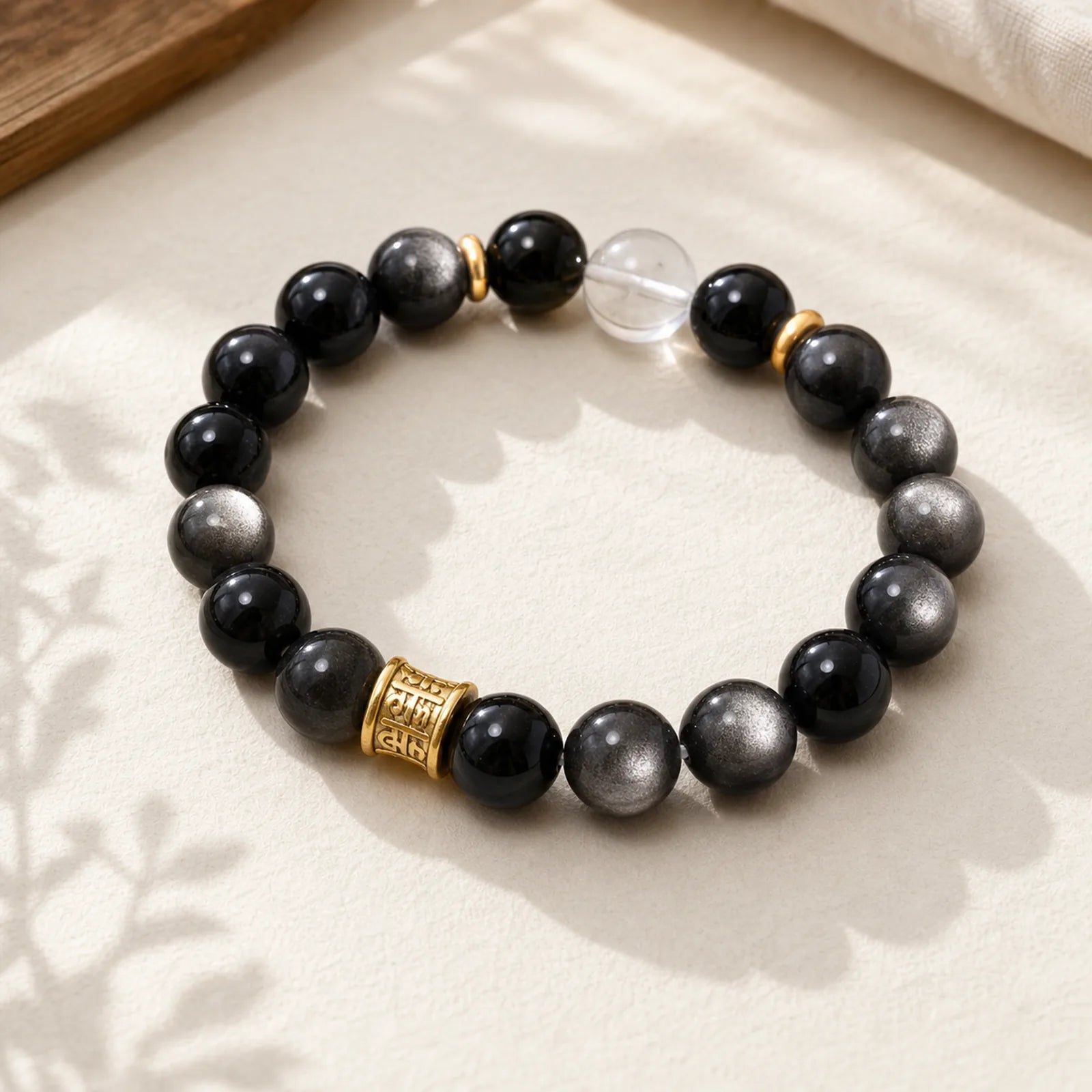 Natural Silver Sheen Obsidian Crystal Om Mani Padme Hum Bead Protection Bracelet featuring Silver, Silver Sheen Obsidian, Obsidian