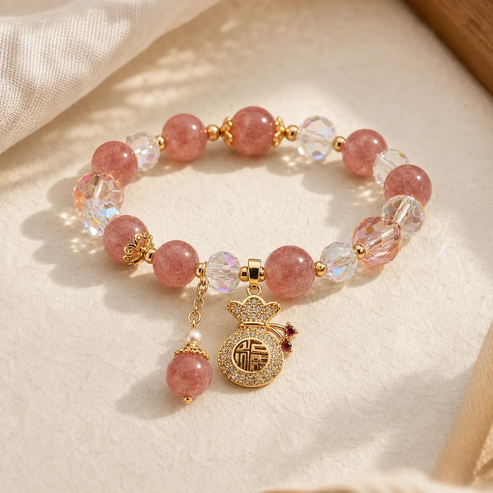 Natural Strawberry Quartz Crystal Money Bag Charm Positive Bracelet featuring Strawberry Quartz