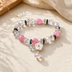 Pink Crystal Green Crystal White Crystal Flower Warmth Bracelet featuring Pink Crystal, Green Crystal, Clear Quartz / White Crystal