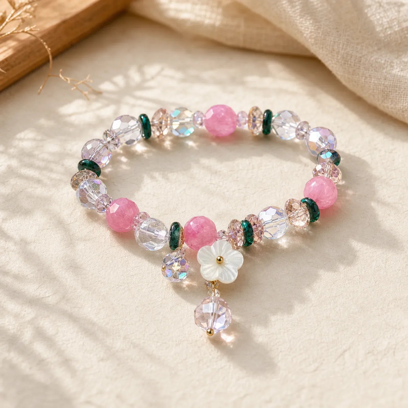 Pink Crystal Green Crystal White Crystal Flower Warmth Bracelet featuring Pink Crystal, Green Crystal, Clear Quartz / White Crystal
