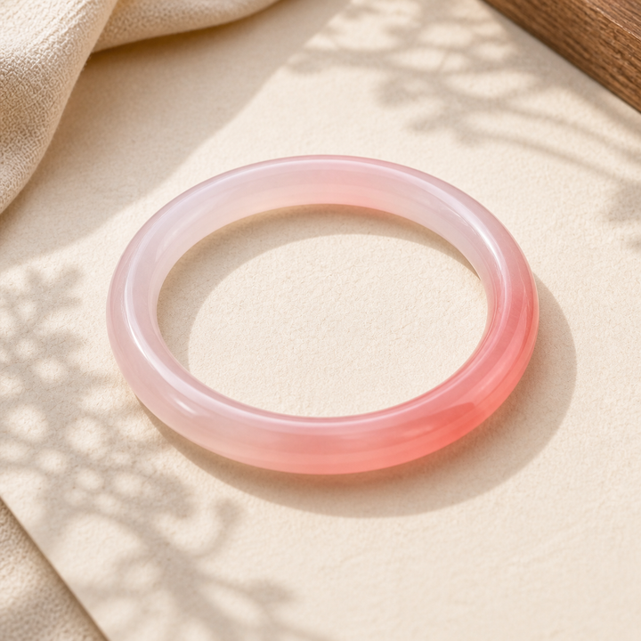 Pink rose quartz bangle bracelet for love and healing, handcrafted gemstone jewelry with soft gradient hue