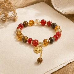 Red Agate Tiger Eye Fox Charm Calm Beaded Bracelet featuring Red Agate, Tiger Eye, Copper