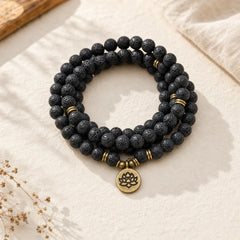 Retro Lotus Symbol Charm Lava Rock Bead Healing New Beginning Mala featuring Lotus Symbol, Lotus, Lava Rock
