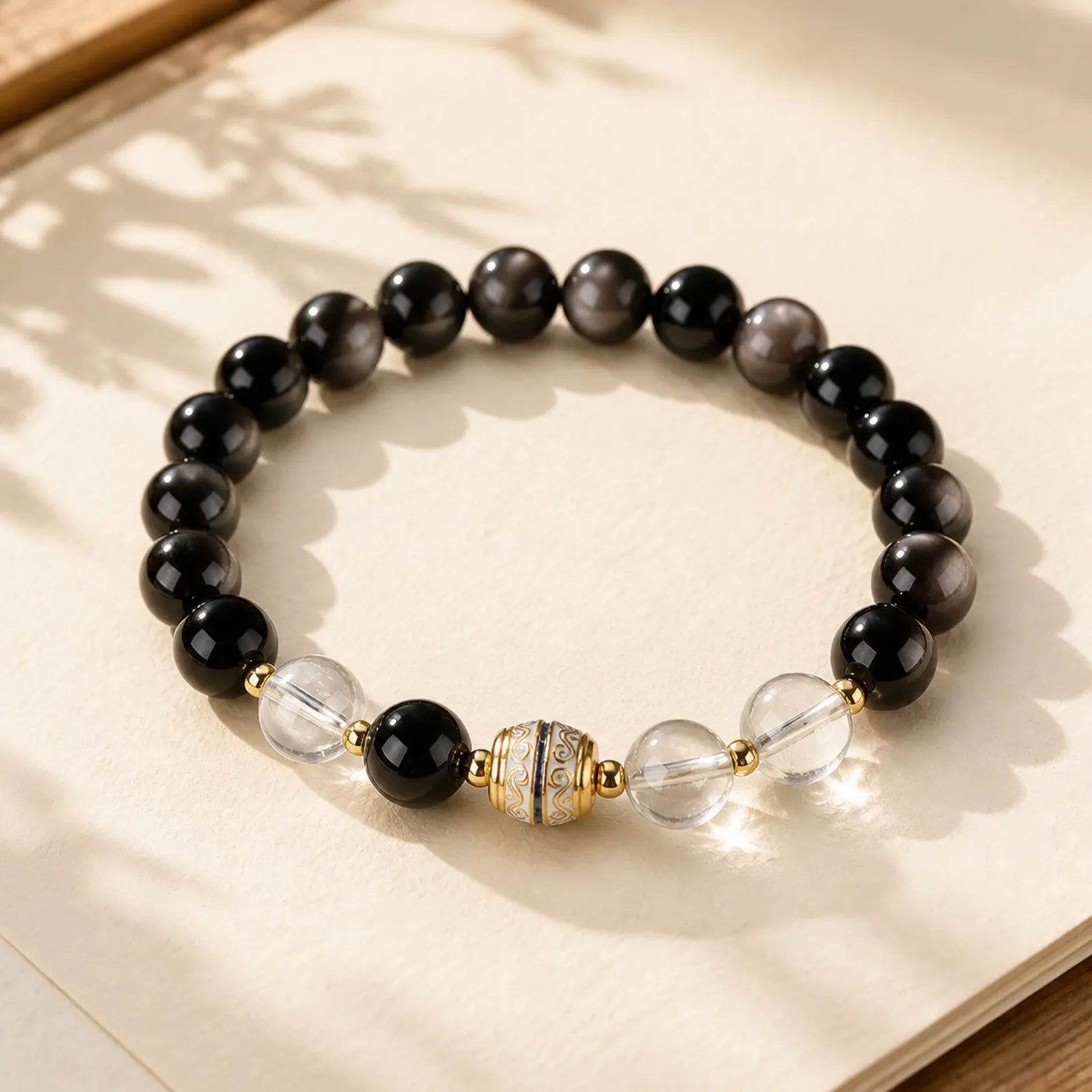 Silver Sheen Obsidian Dzi Bead Protection Round Bracelet featuring Silver, Silver Sheen Obsidian, Obsidian