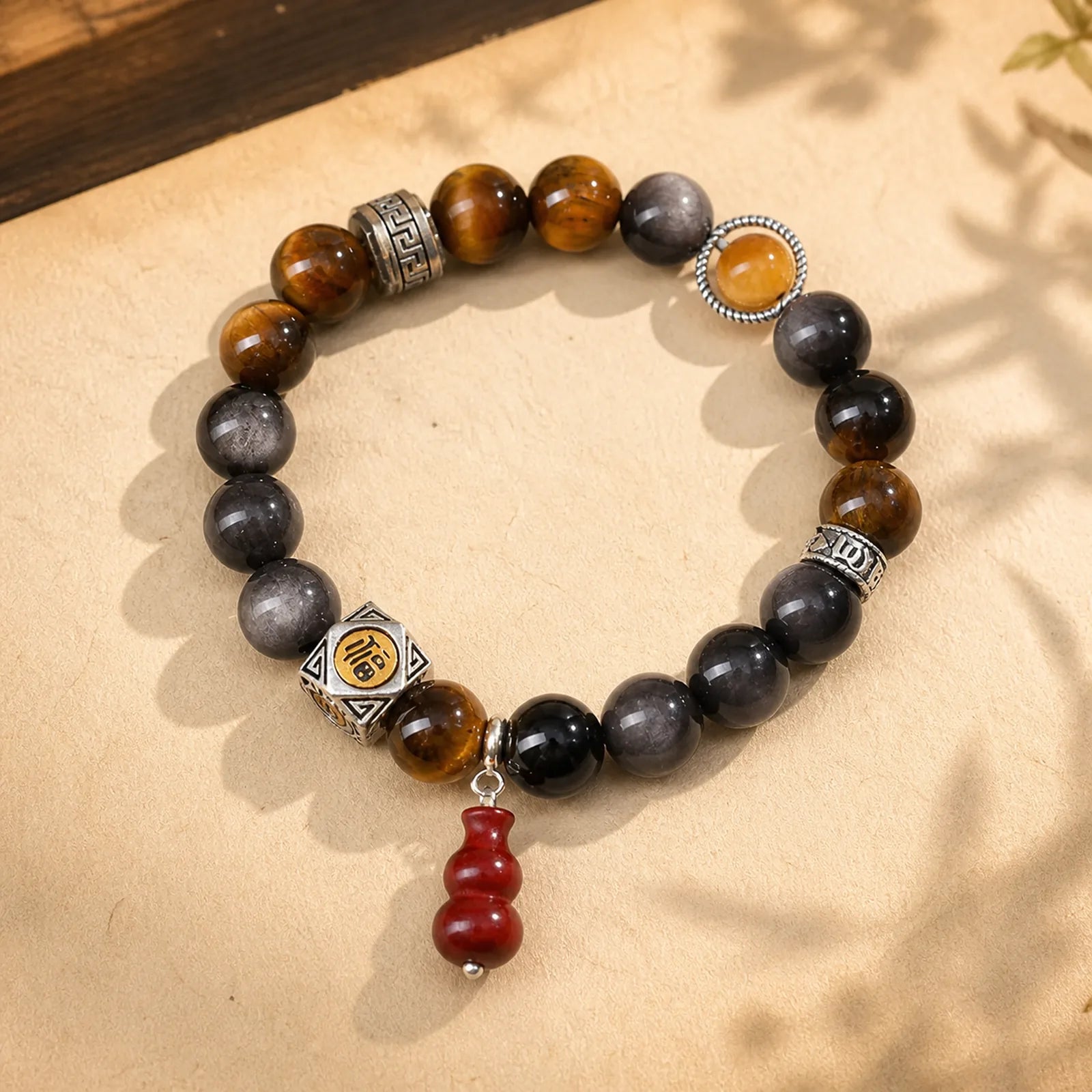 Silver Sheen Obsidian Grounding Fu Character Gourd Bracelet featuring Silver, Silver Sheen Obsidian, Obsidian