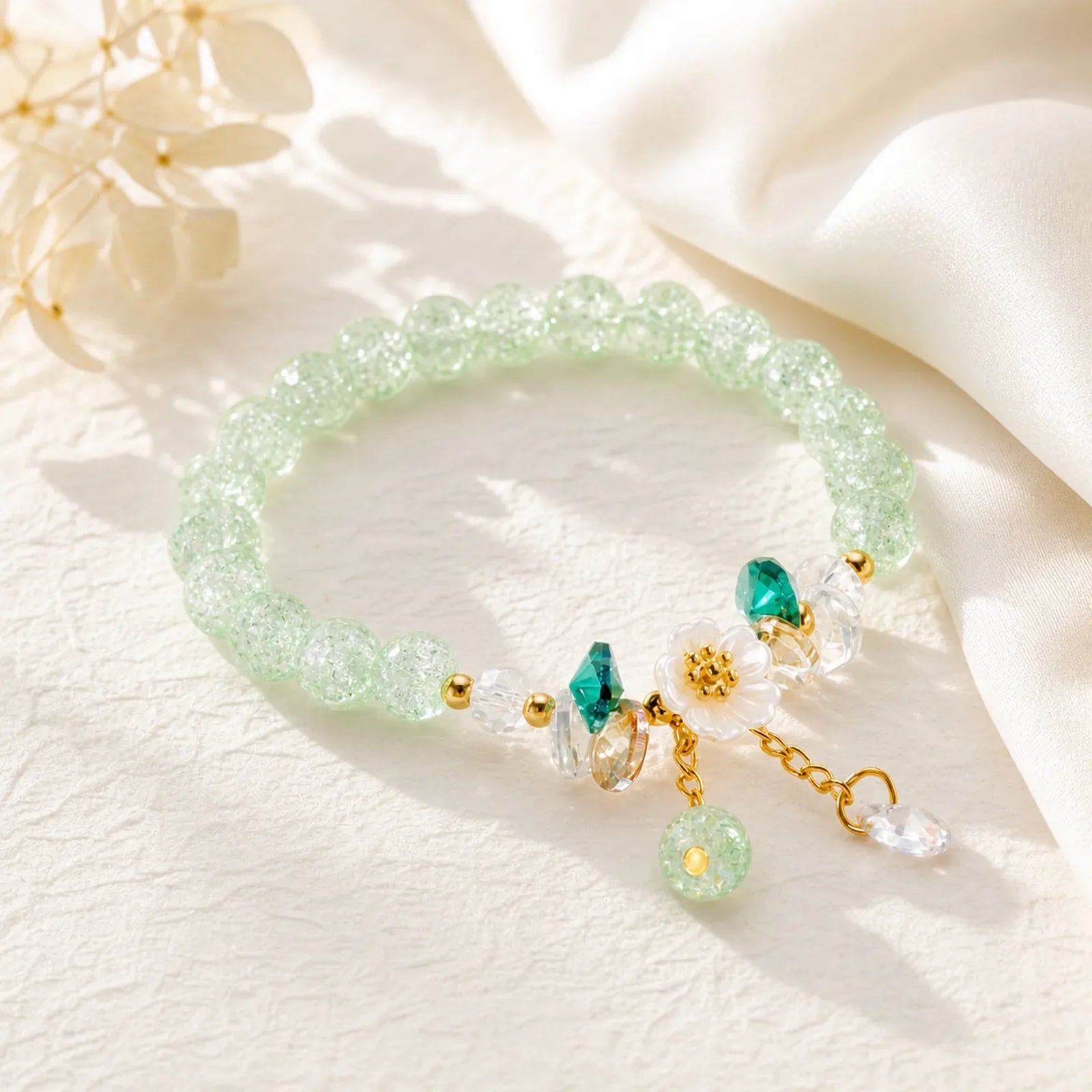 Simple Design Flower Charm Glass Bead Bracelet featuring