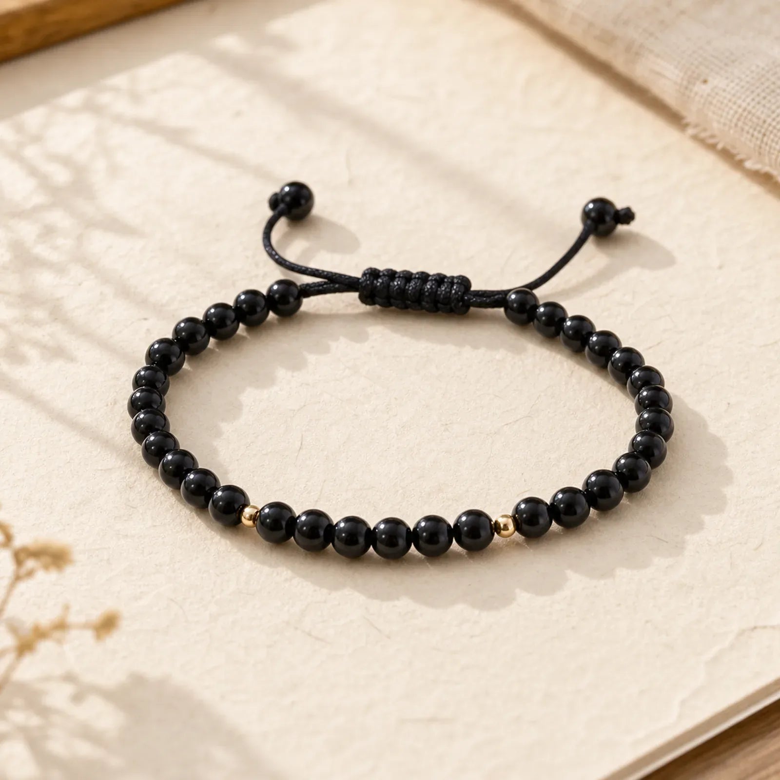 Small Black Obsidian Beads Fulfillment Rope Bracelet featuring Black Obsidian, Copper