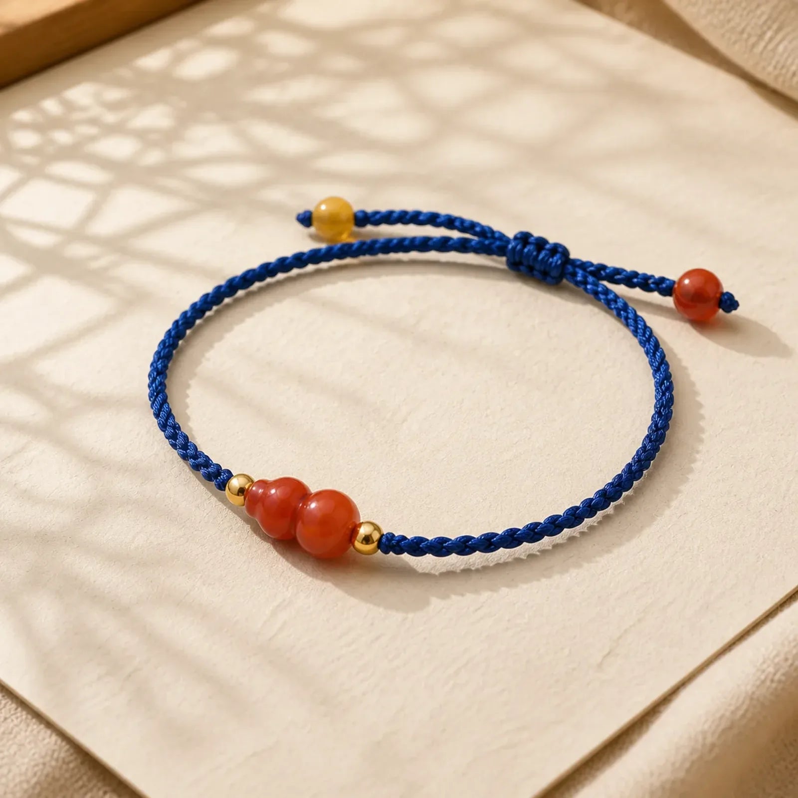 South Red Agate Gourd Positive Hand-Woven Blue String Bracelet featuring South Red Agate, Red Agate, Copper