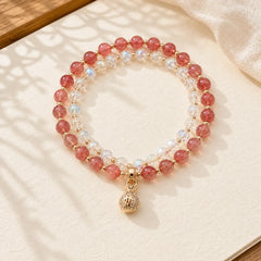 Strawberry Quartz White Crystal Money Bag Charm Positive Bracelet featuring Strawberry Quartz, Clear Quartz / White Crystal, Copper