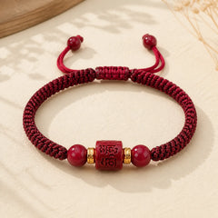 Tibet Cinnabar Om Mani Padme Hum Engraved Blessing Braided Bracelet featuring Cinnabar, Om Mani Padme Hum, Om