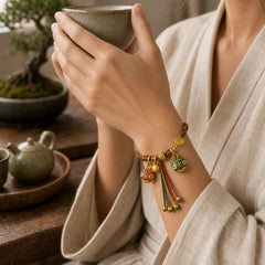 Tibet Gold Swallowing Beast Family Luck Knot Braid Colorful String Bracelet featuring Red String