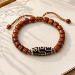 Tibetan Bone Beads Nine-Eye Dzi Bead Protection Bracelet featuring Nine-Eye Dzi Bead, Dzi Bead, Copper