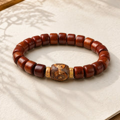 Tibetan Bone Beads Three-Eyed Dzi Bead Sheep Horn Red Agate Strength Bracelet featuring Three-eyed Dzi Bead, Dzi Bead, Sheep Horn