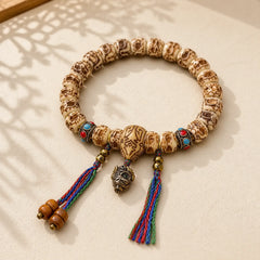 Tibetan Camel Bone Garuda Carved Protection Tassel Bracelet featuring Camel Bone, Garuda, Dragon