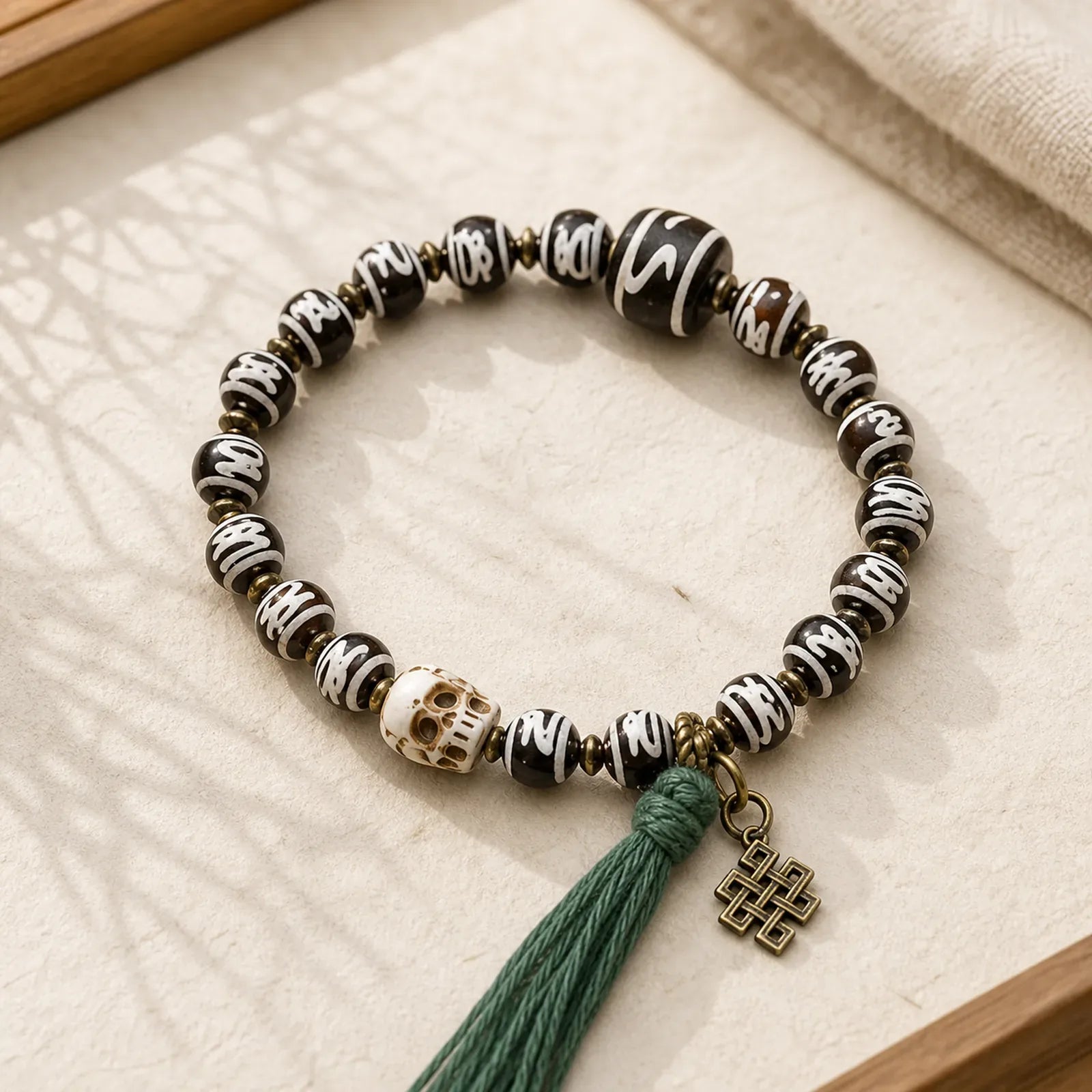 Tibetan Dzi Bead Skull The Lord of the Corpse Forest Wealth Bracelet featuring Dzi Bead, The Lord of the Corpse Forest, Nine-Eye Dzi Bead