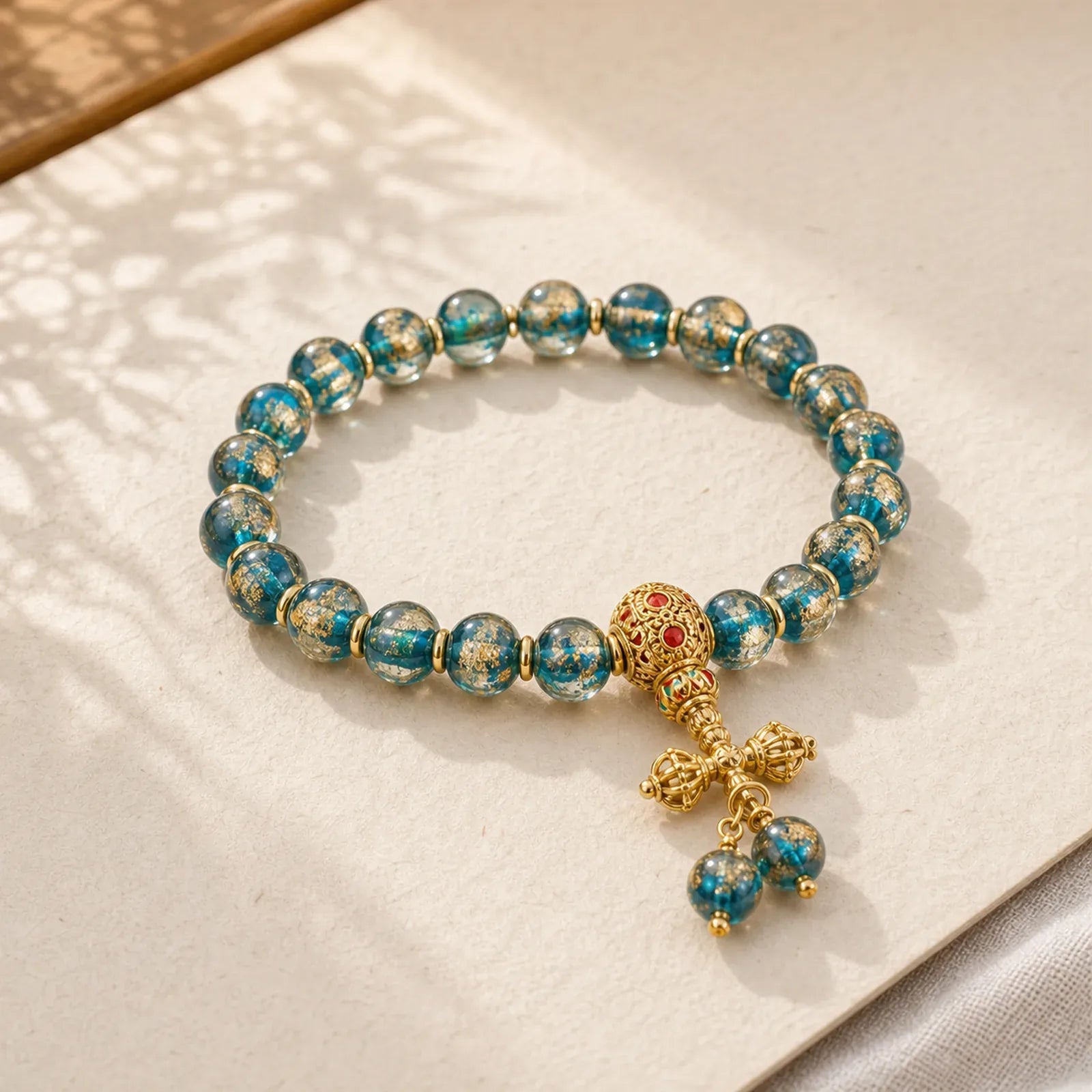 Tibetan Gold Swallowing Beast Family Dorje Vajra Strength Bead Bracelet featuring Vajra, Turquoise