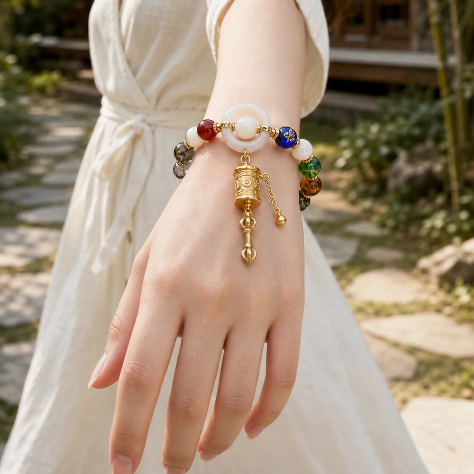 Tibetan Incense Ash Liuli Glass Tridacna Stone Sun Stone Om Mani Padme Hum Prayer Wheel Charm Bracelet featuring Tridacna Stone, Sun Stone, Om Mani Padme Hum