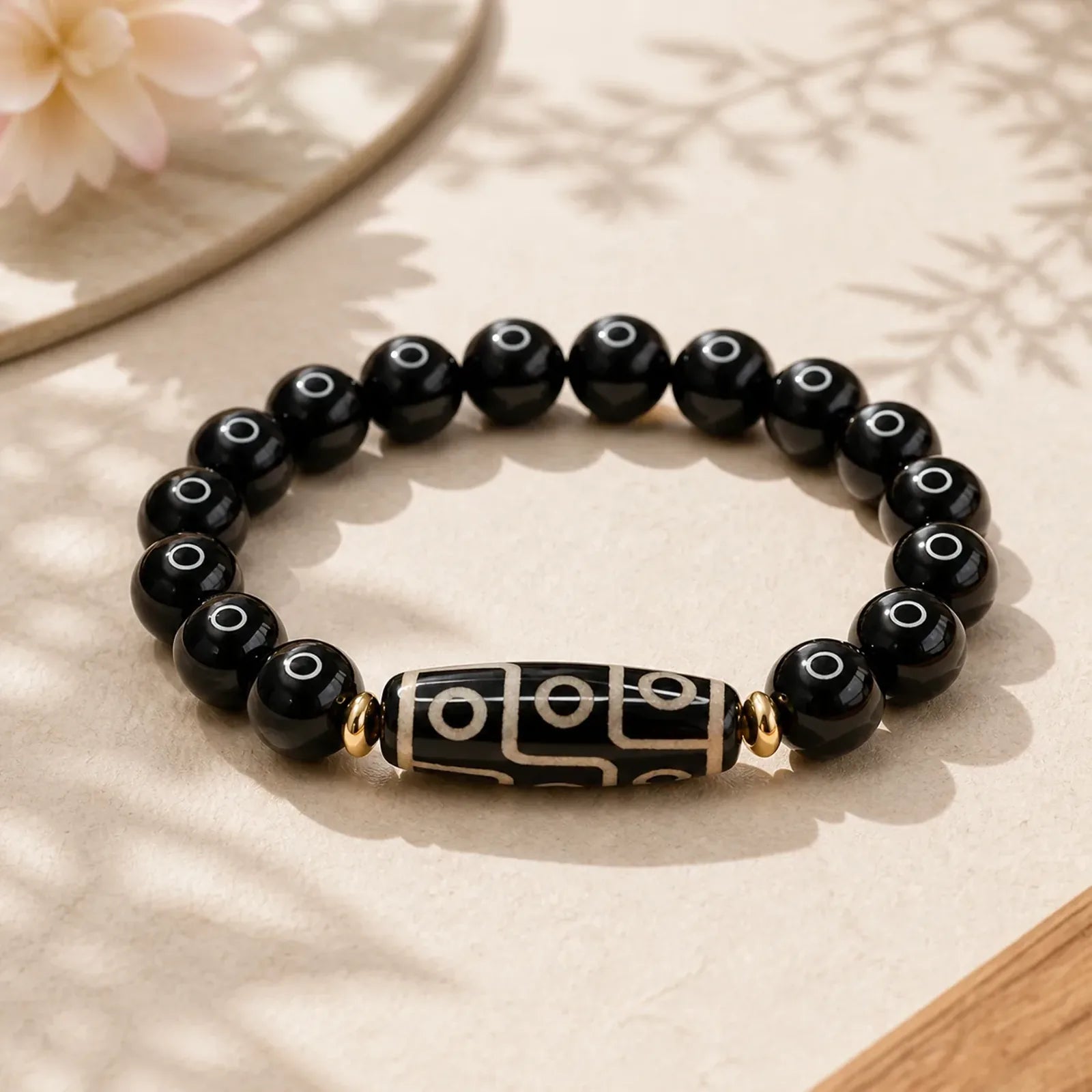 Tibetan Nine-Eye Dzi Bead Black Onyx Power Bracelet featuring Nine-Eye Dzi Bead, Dzi Bead, Black Onyx