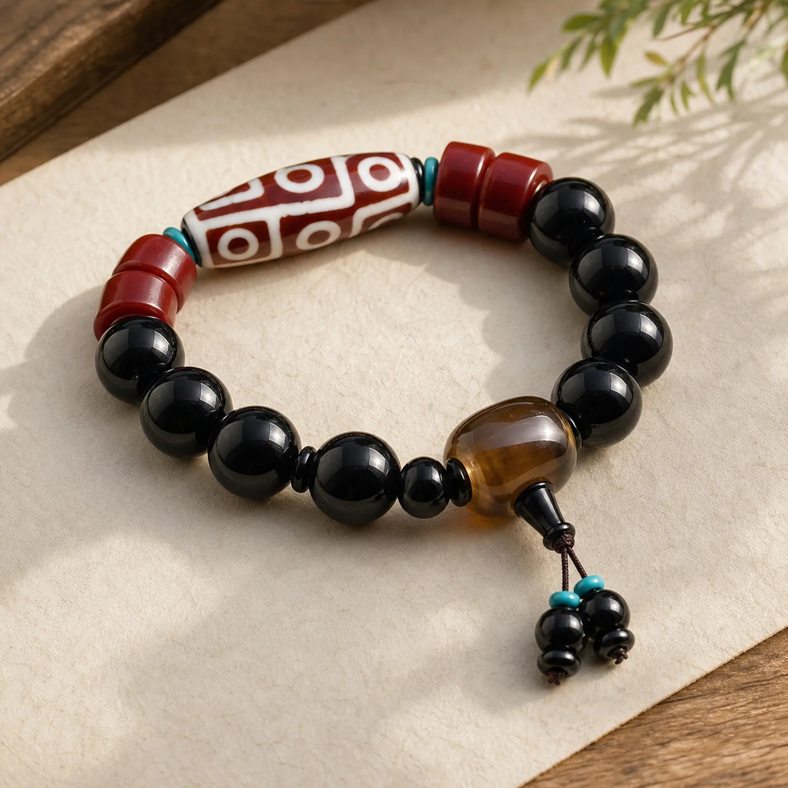 Tibetan Nine-Eye Dzi Bead Black Onyx Wealth Protection Bracelet featuring Nine-Eye Dzi Bead, Dzi Bead, Black Onyx