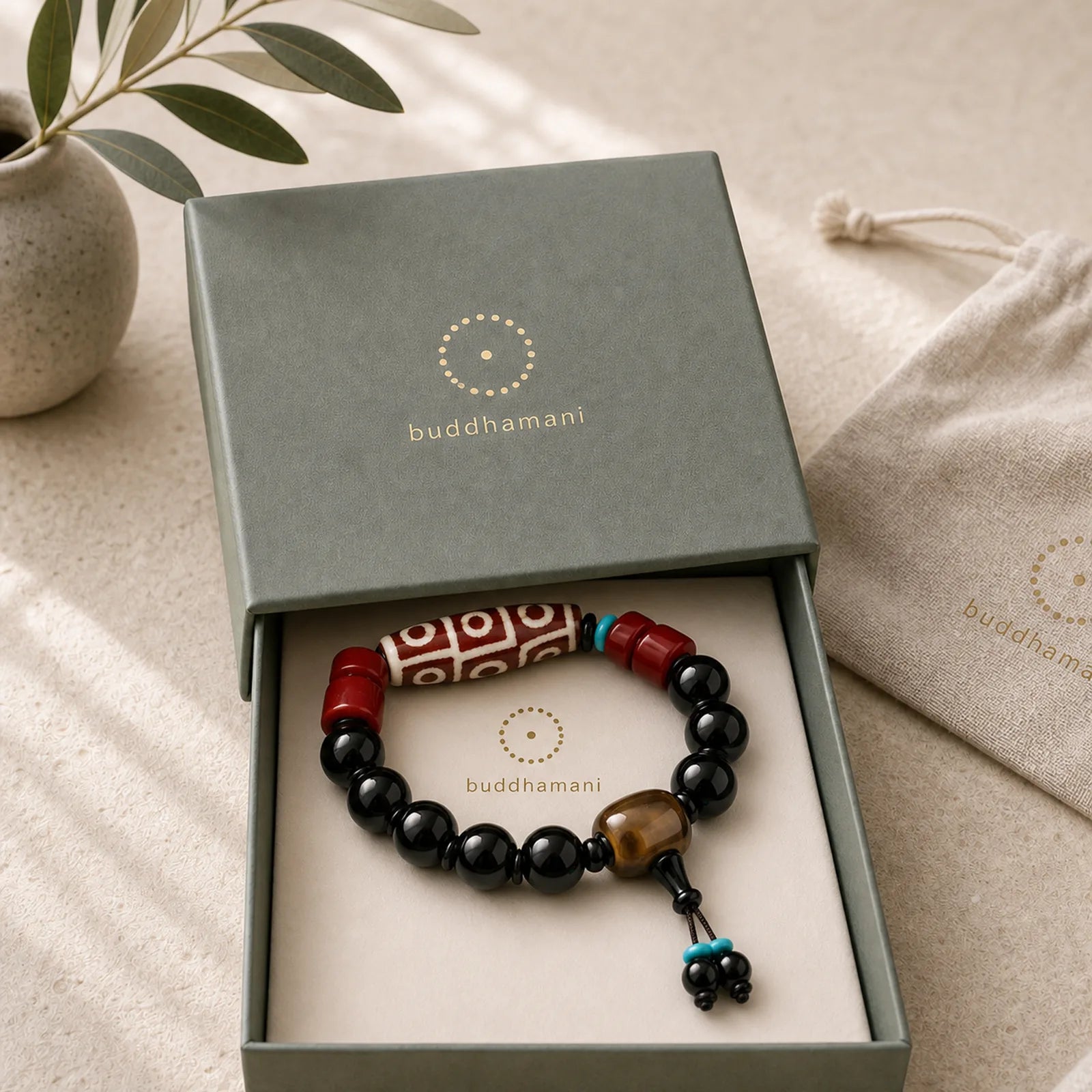 Tibetan Nine-Eye Dzi Bead Black Onyx Wealth Protection Bracelet featuring Nine-Eye Dzi Bead, Dzi Bead, Black Onyx
