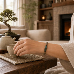 Tibetan Nine-Eye Dzi Bead Green Sandalwood Peace Bracelet featuring Nine-Eye Dzi Bead, Dzi Bead, Green Sandalwood