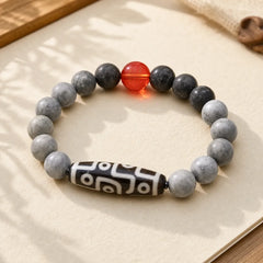 Tibetan Nine-Eye Dzi Bead Picasso Jasper Positive Bracelet featuring Nine-Eye Dzi Bead, Dzi Bead, Picasso Jasper