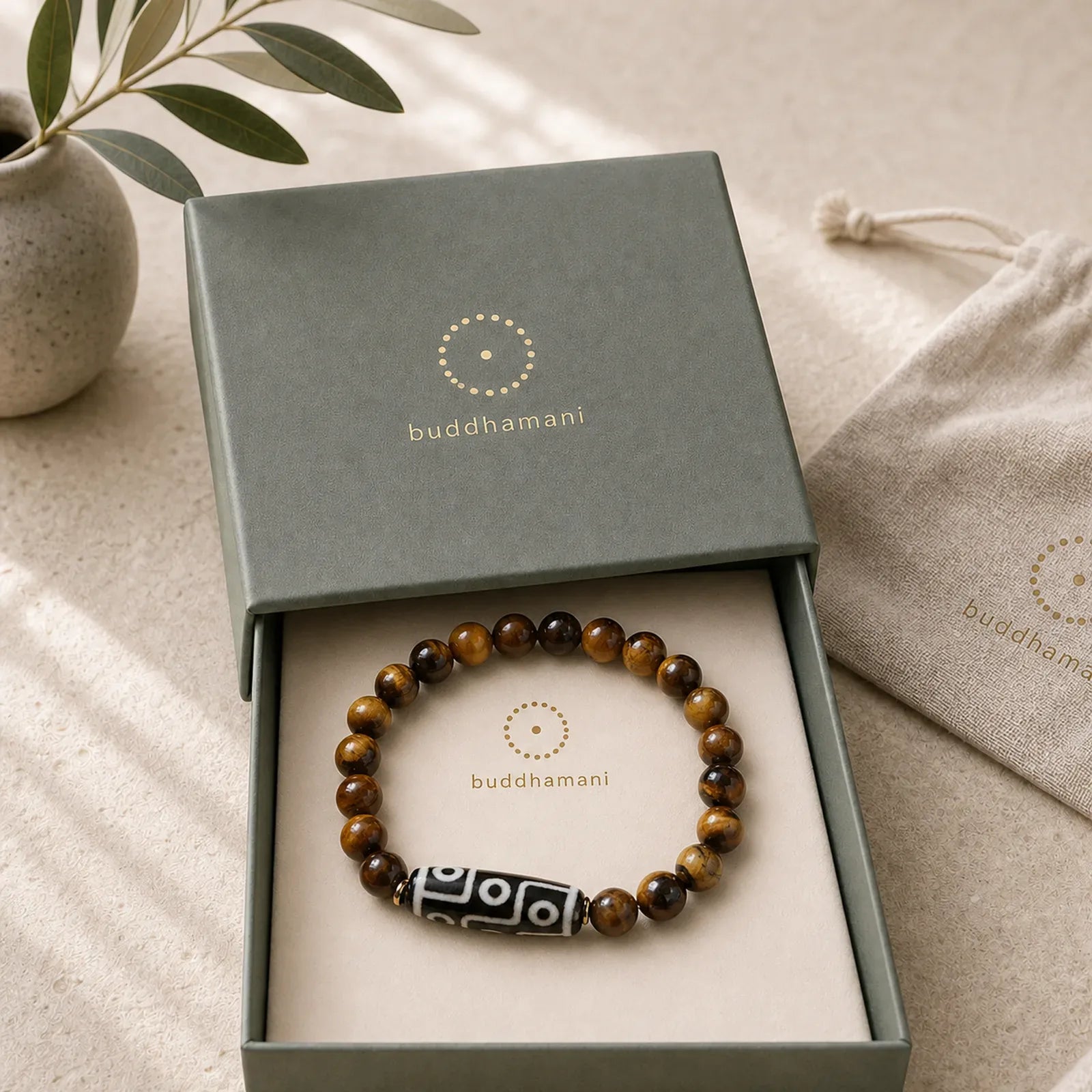 Tibetan Tiger Eye Tourmaline Nine-Eye Dzi Bead Protection Bracelet featuring Tiger Eye, Tourmaline, Nine-Eye Dzi Bead