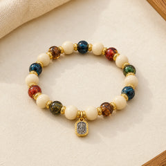 Tibetan Zakiram Goddess of Wealth Charm Liuli Glass Incense Ash Porcelain Bead Protection Bracelet featuring