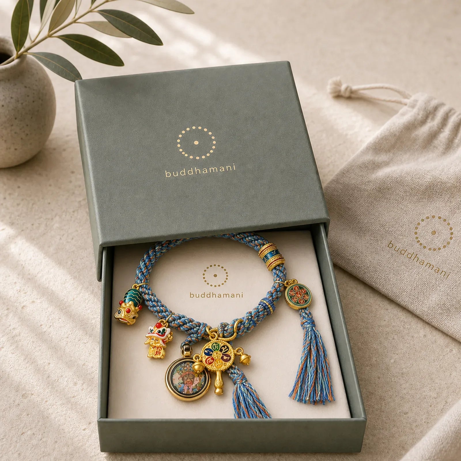 Tibetan Zakiram Goddess of Wealth Thangka Luck Prayer Wheel Braid String Bracelet featuring