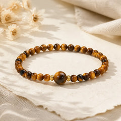Tiger Eye Black Obsidian Courage Beads Bracelet featuring Tiger Eye, Black Obsidian, Super Seven Crystal