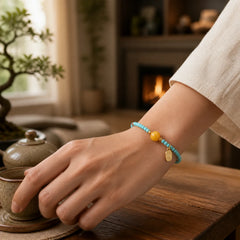 Turquoise Fu Character Luck Handcrafted Beaded Bracelet featuring Turquoise, Fu Character, Amber