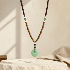Wenge Wood Peace Buckle Balance Tranquility Pendant Necklace featuring Wenge Wood, Peace Buckle, Copper