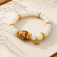 White Bodhi Seed Tibetan Engraved Orange Oval Lotus Pendant Blessing Bead Bracelet featuring Bodhi Seed, Lotus, Lotus Symbol