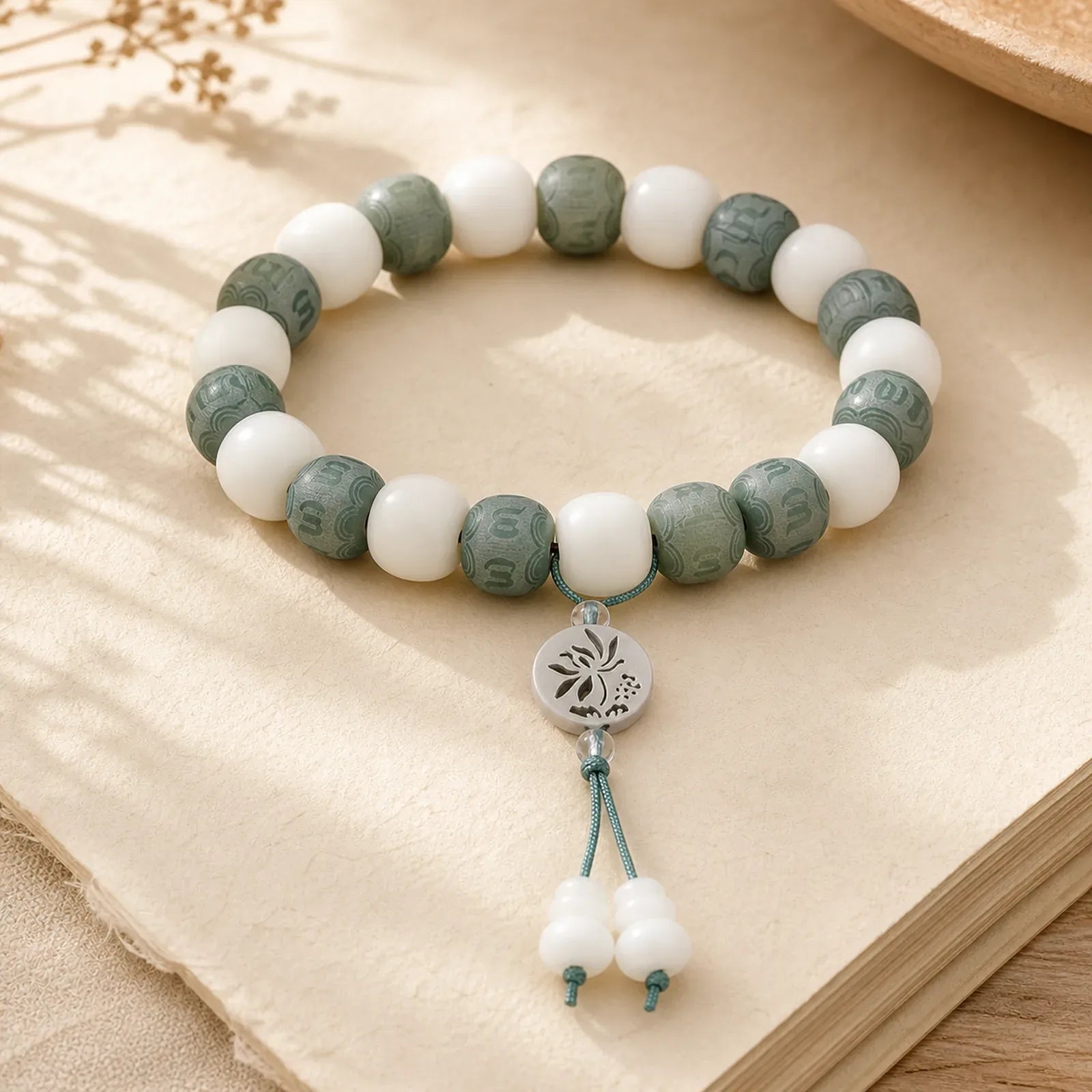 White Bodhi Six True Words Protection Bracelet featuring Om, Jade, Bodhi Seed