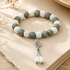 White Bodhi Six True Words Protection Bracelet featuring Om, Jade, Bodhi Seed