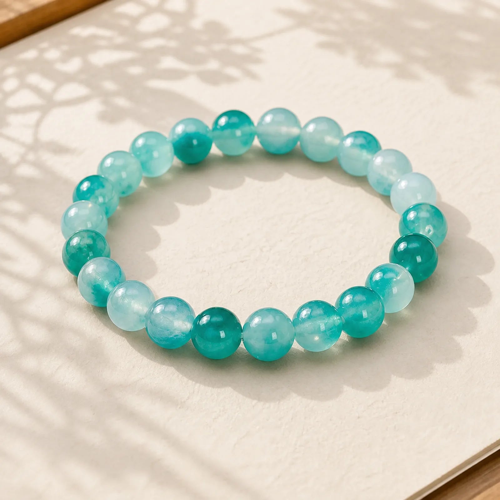 White Chalcedony Emotional Balance Blue Floral Round Bead Bracelet featuring Chalcedony, Jade