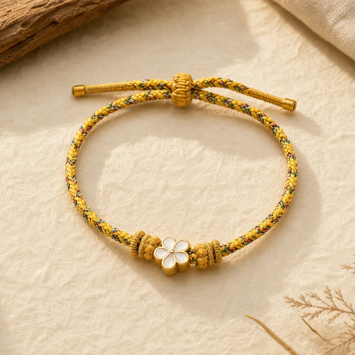 Yellow Braided Rope Flower Rootedness Bracelet featuring Red String