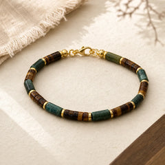 FREE Today: Self Care and Strength Lapis Lazuli Tiger Eye Cylindrical Bead Bracelet featuring Tiger Eye