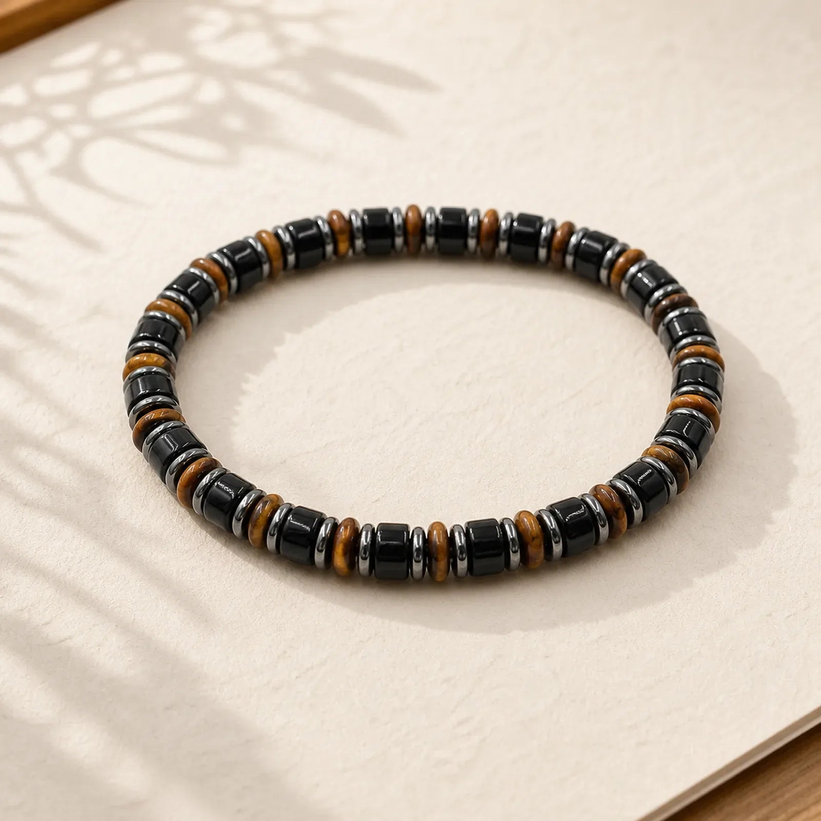 FREE Today: Transformation and Strength Black Obsidian Hematite Ethnic Flat Bead Bracelet featuring Black Obsidian, Hematite