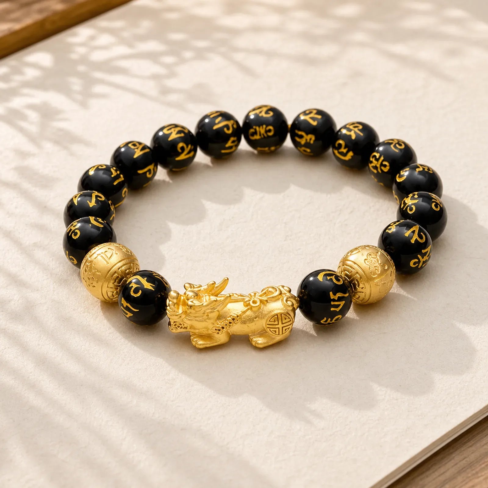 Feng Shui PiXiu Obsidian Attract Wealth Bracelet featuring Pixiu, Obsidian, Om