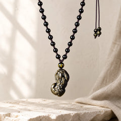 FengShui Gold Sheen Obsidian PiXiu Wealth Necklace (Extra 35% Off | USE CODE: FS35) featuring Gold Sheen Obsidian, Obsidian, Pixiu